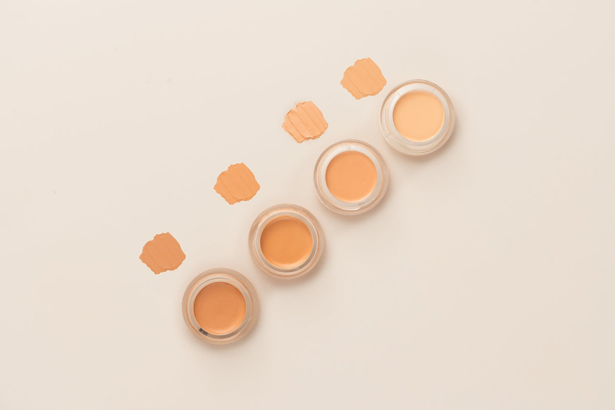 Hydrating Concealer four jars with shade swipes