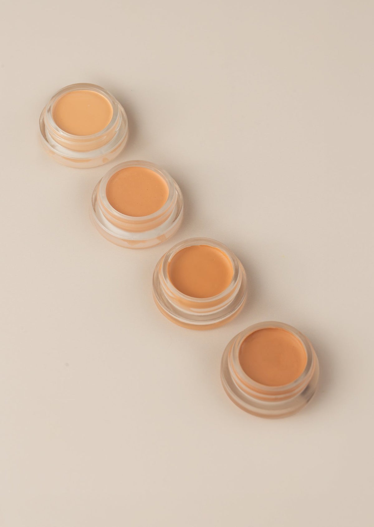 Hydrating Concealer four jars, angled close-up